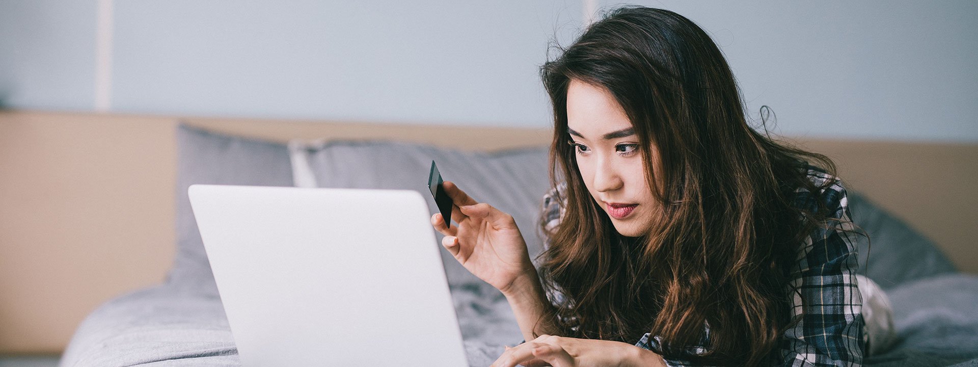 Woman looking at her laptop