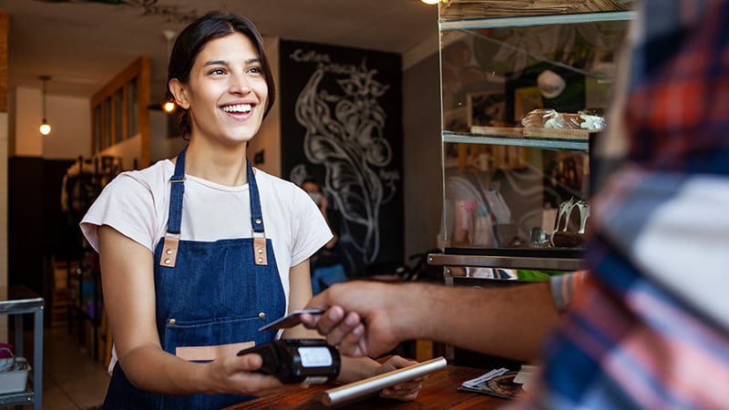 woman receiving contactless payment